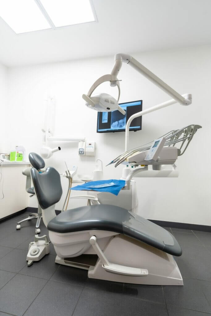 modern-dental-practice-dental-chair-medical-ligh-2023-11-27-05-03-58-utc-scaled.jpg