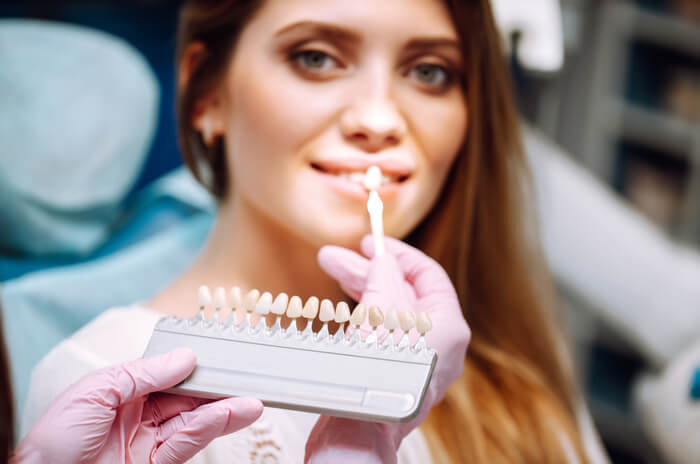 young-woman-at-the-dentist-s-chair-during-a-dental-2023-11-27-05-36-10-utc